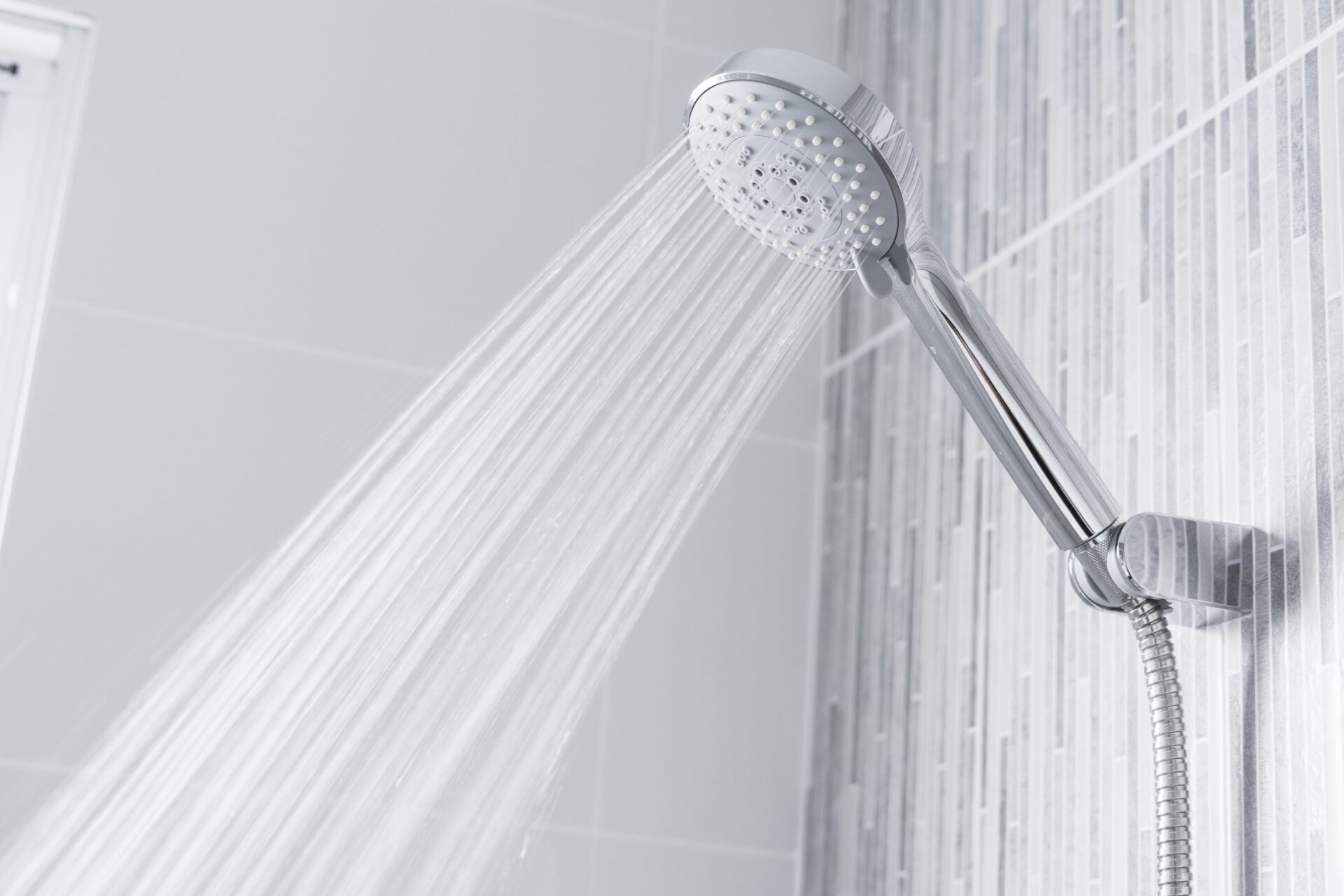 Bathroom shower head spraying water